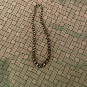Authentic Tiffany$Co silver bead necklace.